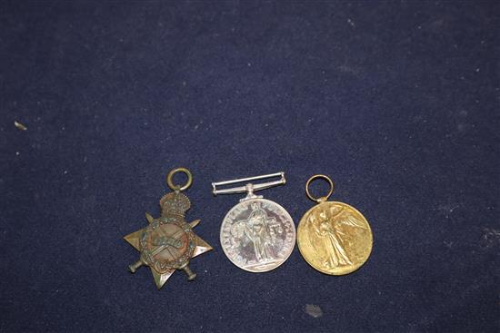 A collection of WWI police medals, sundry coins and an 18ct gold ladys watch
